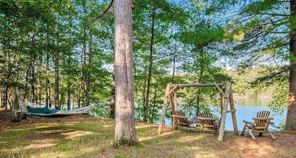 Charming riverfront home with a fireplace, dock, washer/dryer - close to town