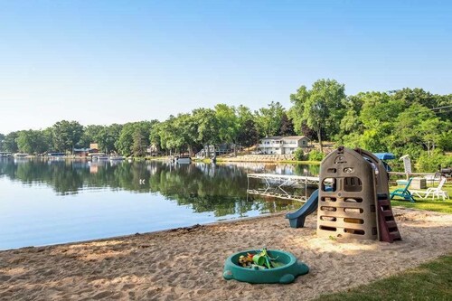 Lakefront condo near golf with amazing views, private beach access, & fireplace