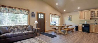 Modern dog-friendly cabin with hot tub, gas fireplace, patio, grill, & washer/dr