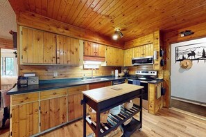 Fridge, microwave, oven, stovetop - Lakefront cabin with kayaks, firepit, dock & spacious interior (Woodruff)