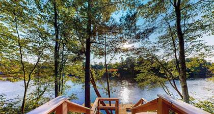 New dog-friendly cabin with river views, grill, modern interior, W/D, and AC