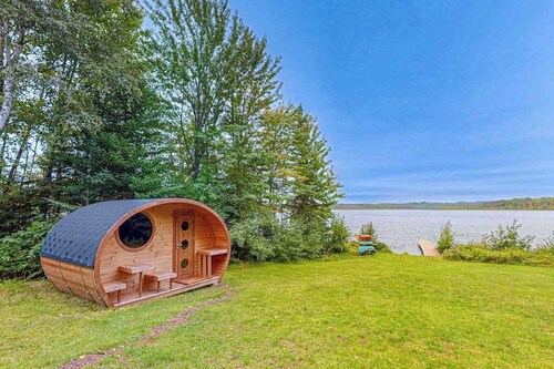 Dog-friendly lakefront home with boat access, deck, fireplace, gas grill, kayaks