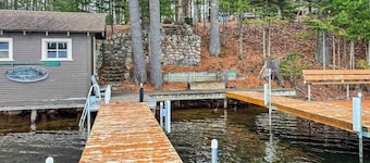 Sprawling lakeside home with dock, kayaks, pool table, fireplace, grill, & AC