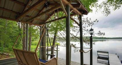 All-seasons lakefront cabin with dock, wood fireplace, kitchen, kayaks, & AC