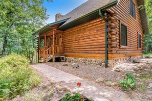 Exterior - Riverfront cabin with a dock, kayaks and a canoe - firepit and water views (Lyndon Station)