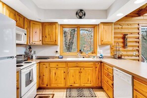 Fridge, microwave, oven, stovetop - Secluded, dog-friendly home with tree-lined view, firepit, fireplace, & deck (Friendship)