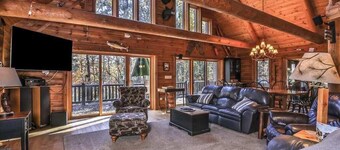 Dog-friendly, lakefront lodge in the woods with large dock, central AC, & canoe