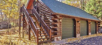 Dog-friendly, lakefront lodge in the woods with large dock, central AC, & canoe