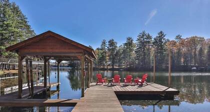 Dog-friendly, lakefront lodge in the woods with large dock, central AC, & canoe