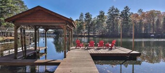 Dog-friendly, lakefront lodge in the woods with large dock, central AC, & canoe