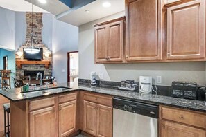Fridge, microwave, oven, stovetop - Inviting ground-floor condo with fireplace, patios, AC, & jetted tub (Wisconsin Dells)