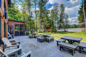 Outdoor dining - Plush lakefront lodge with private dock, high-speed WiFi, & game room (Eagle River)