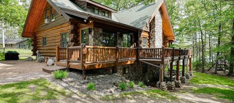 Secluded waterfront log cabin with game room, dock, fire pit & deck