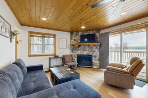 TV, fireplace, offices - Inviting lakefront condo - amazing views, beach access, fireplace, dock, AC, W/D (Wisconsin Dells)