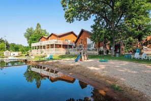 Exterior - Lakefront condo with deck, amazing views, private beach access, fireplace & dock (Wisconsin Dells)