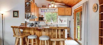 Riverfront home with private dock, kayaks, views, firepit, cornhole & foosball