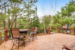 Outdoor dining - Riverfront home with private dock, kayaks, views, firepit, cornhole & foosball (Eagle River)
