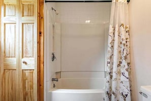 Shower, towels - Riverfront home with private dock, kayaks, views, firepit, cornhole & foosball (Eagle River)