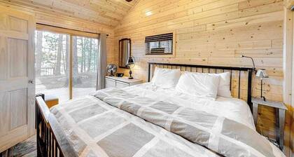 Lakefront home with dock, swimming area, & wood stove - sunset views