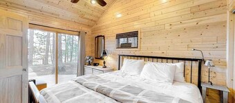 Lakefront home with dock, swimming area, & wood stove - sunset views