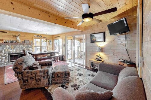 Lakefront home with dock, swimming area, & wood stove - sunset views