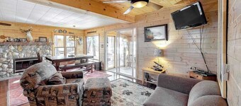 Lakefront home with dock, swimming area, & wood stove - sunset views