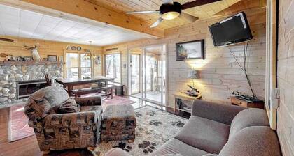 Lakefront home with dock, swimming area, & wood stove - sunset views