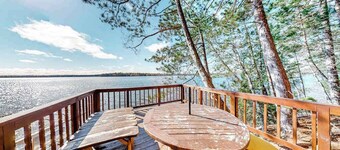 Lakefront home with dock, swimming area, & wood stove - sunset views