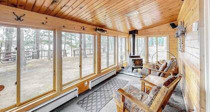 Lakefront home with dock, swimming area, & wood stove - sunset views