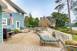 Outdoor dining - Gorgeous lakefront home with dock, sandy beach area, fireplace, huge deck & WIFI (Minocqua)