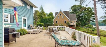 Gorgeous lakefront home with dock, sandy beach area, fireplace, huge deck & WIFI