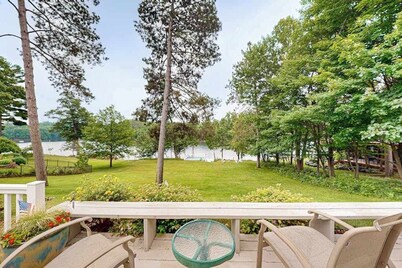 Gorgeous lakefront home with dock, sandy beach area, fireplace, huge deck & WIFI