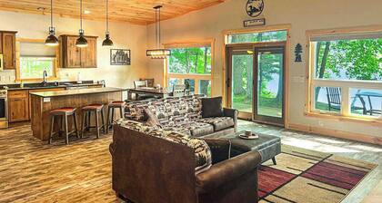 Dog-friendly lakefront hideaway with docks, firepit, fireplace & W/D