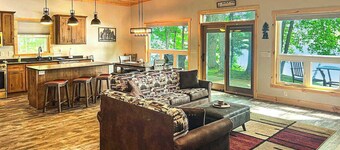 Dog-friendly lakefront hideaway with docks, firepit, fireplace & W/D