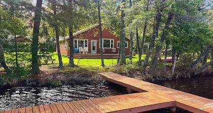 Dog-friendly lakefront property with dock, boat lift, firepit & hot tub