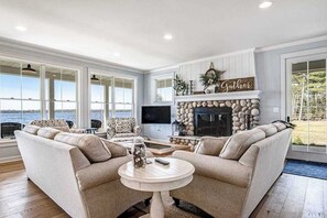 TV, fireplace - Two dog-friendly lakefront homes with docks, kayaks, rowboat, firepits & beach (St. Germain)