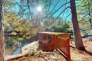 Exterior - Riverfront home on the Manitowish Riverway w/ fire pit, kayaks & boat house (Manitowish Waters)