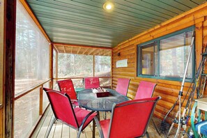 Outdoor dining - Riverfront home on the Manitowish Riverway w/ fire pit, kayaks & boat house (Manitowish Waters)