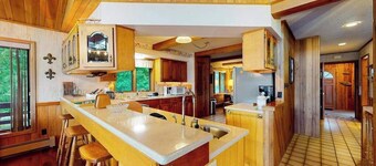 Lakefront home on South Two Lakes with lake views, lake access, firepit, & dock