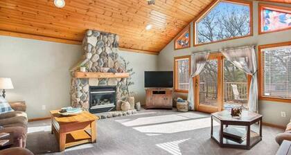 Riverfront golf resort condo with pool, hot tub, volleyball, & fairway-view deck