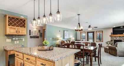 Condo at waterfront resort with golf course views, central AC, W/D, & pool