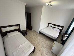 Quarto triplo conforto, sacada, vista para a montanha