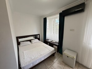 Quarto triplo conforto, sacada, vista para a montanha