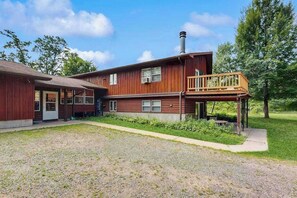 Exterior - Cozy wooded duplex w/ WiFi, full kitchen, shared W/D & near lakes & trails (Arkdale)