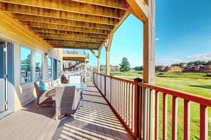 Outdoor dining - Golf course-front condo with pool, hot tub, dock, tennis, golf, & private beach (Arkdale)