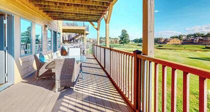 Golf course-front condo with pool, hot tub, dock, tennis, golf, & private beach