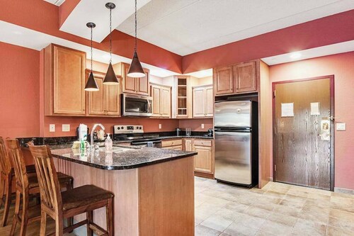 Serene river-view condo with in-room jetted tub & two fireplaces