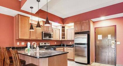 Serene river-view condo with in-room jetted tub & two fireplaces