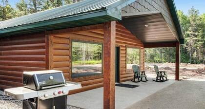 Contemporary dog-friendly cabins with hot tub, fireplaces, patios, & washers + dryers