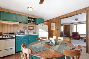 Dining - Cozy, family-friendly, riverview condo w/ a furnished patio & gas fireplace (Eagle River)